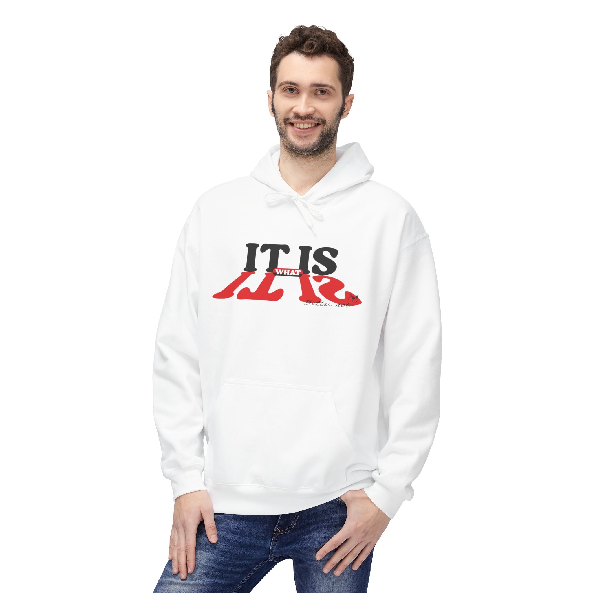 A man in a "Printify - It Is What It Is" white hoodie, made with eco-friendly production and featuring black and red text, smiles while posing with one hand in his jeans pocket against a white background.