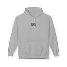 The Bad Decisions Hoodie by Printify is a sustainable gray hoodie featuring "BID" in black on the chest, a front pocket, and drawstring, crafted through ethical manufacturing for stylish comfort.