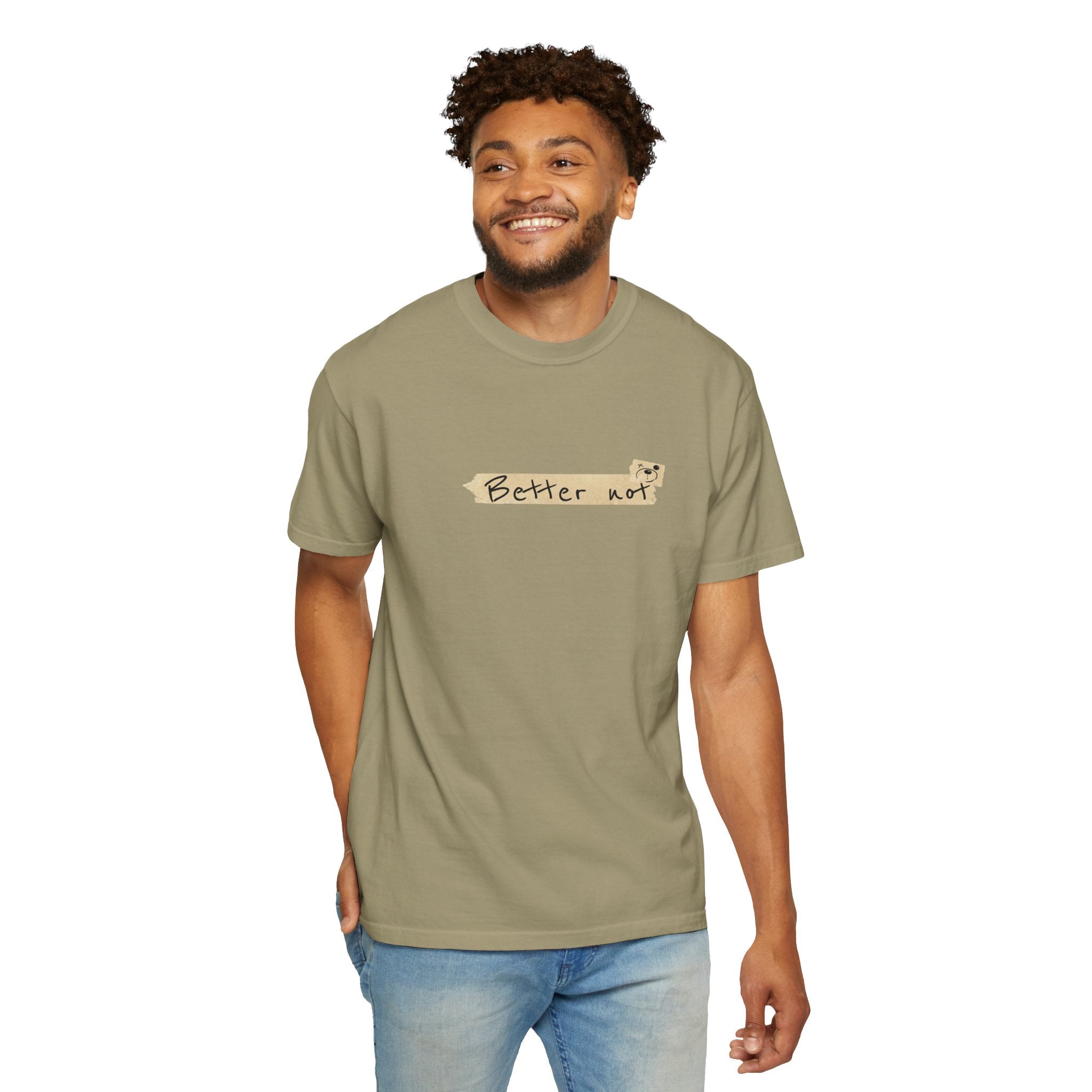 A smiling person stands wearing a green Printify "Note to self Tee.