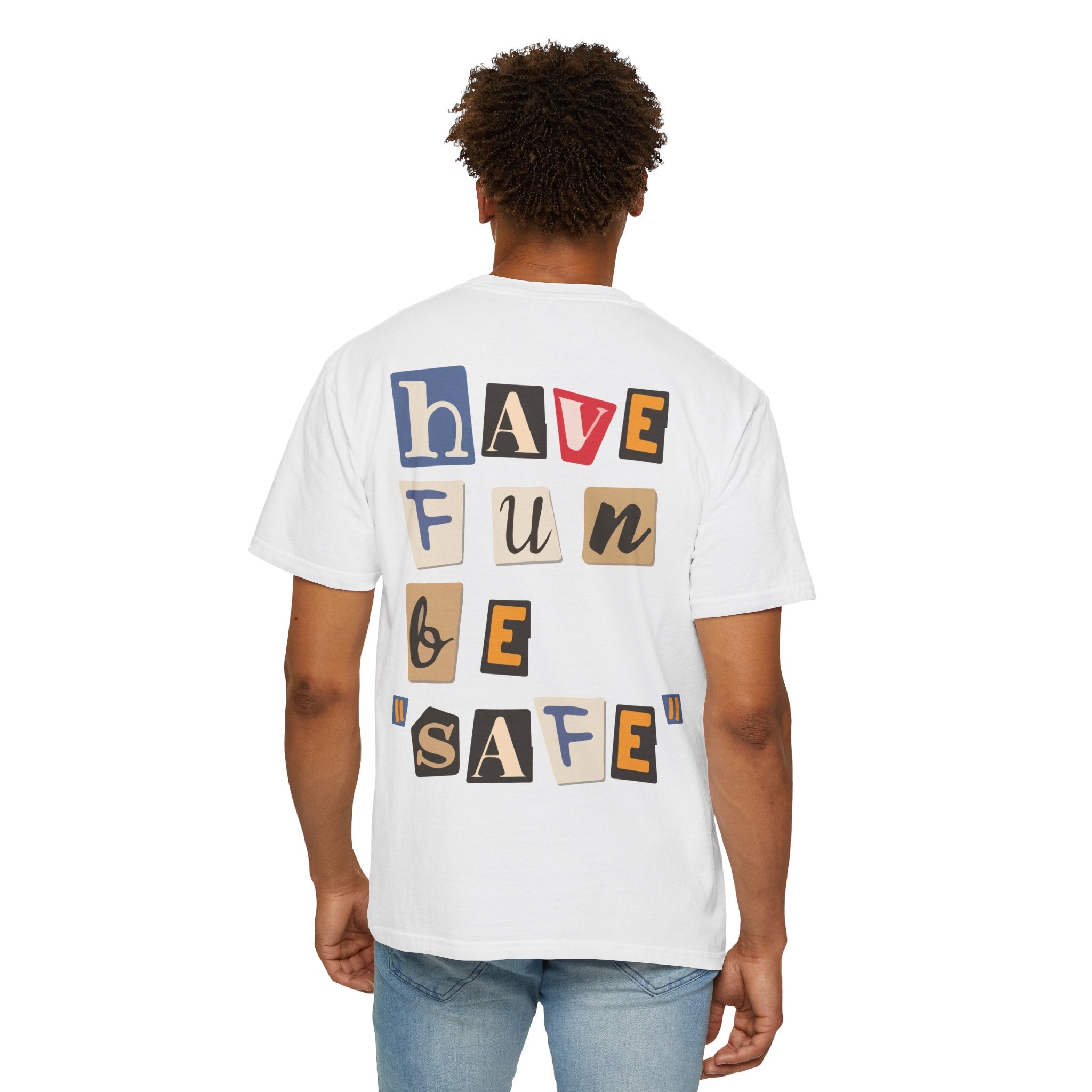 Someone wearing Printify's Have Fun Be "Safe" Tee made from premium soft US cotton, featuring multicolored back letters saying "have fun be safe.