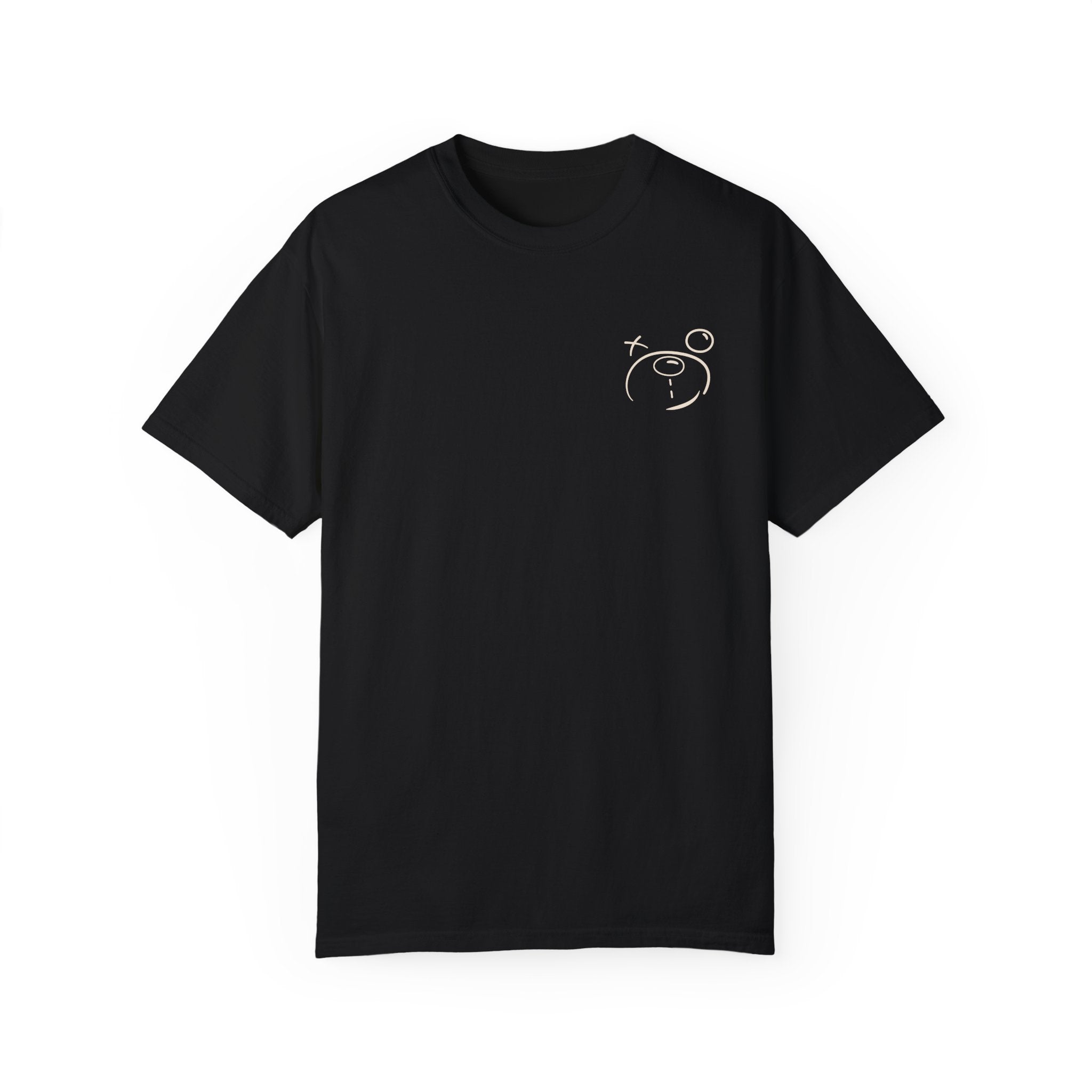 The Have Fun Be "Safe" Tee by Printify is a black Comfort Colors T-shirt made from high-quality ring-spun US cotton, with a minimalist bear face and star design on the upper left. It's garment-dyed for added softness and comfort.