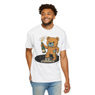 A man wears the Printify Podium Bear Tee, crafted from 100% US cotton, featuring a playful cartoon bear with a champagne bottle standing confidently on a podium.