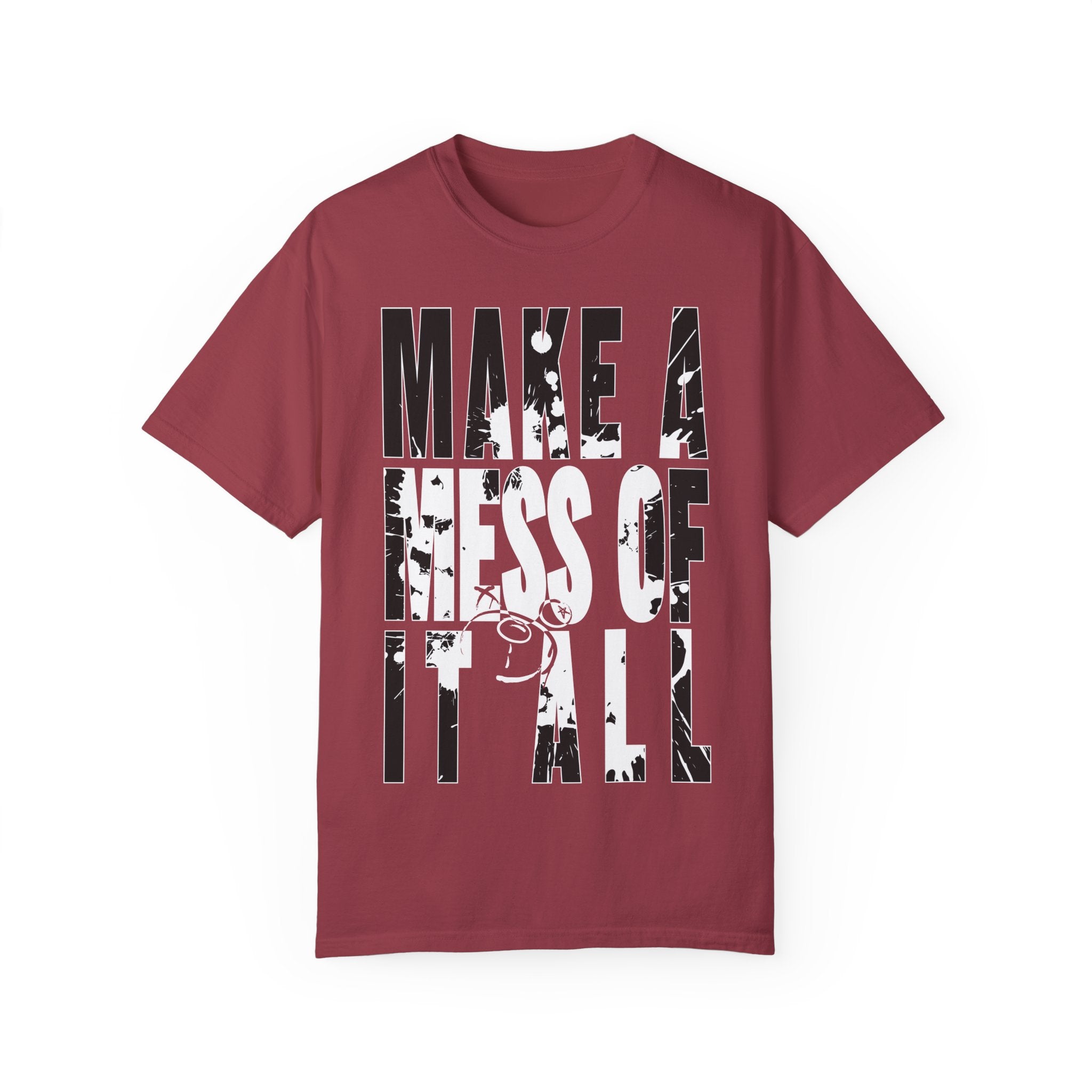 Printify's Make A Mess Tee is a red garment-dyed T-shirt crafted from ring-spun US cotton, featuring bold white and black text saying "Make A Mess Of It All" on the front.