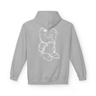 The Graffiti Bear Hoodie by Printify is a gray hoodie adorned with a white bear sketch on the back, highlighting patches and stitching outline design. Made for eco-conscious consumers, it emphasizes sustainability.