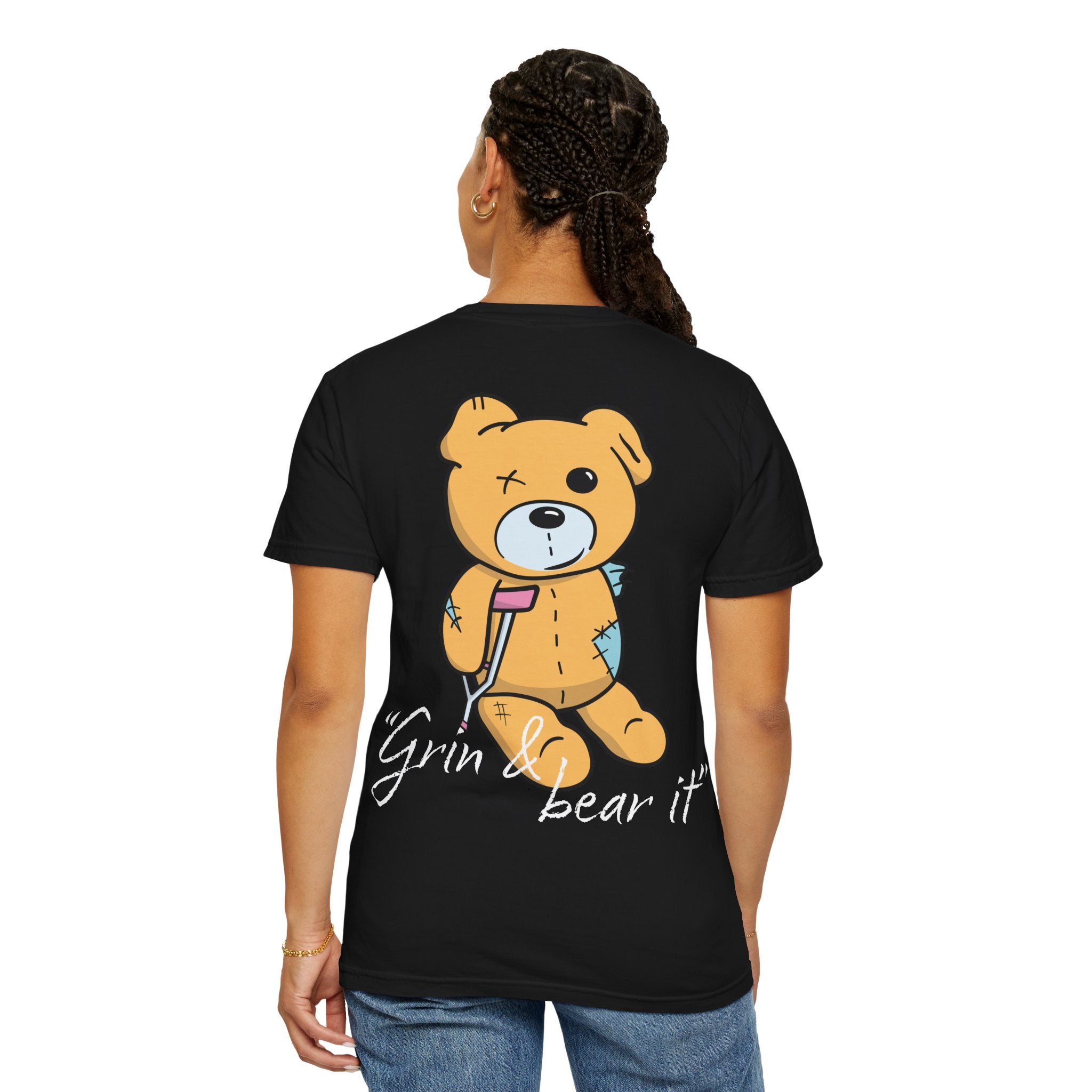 Wearing Printify's "Grin & Bear It Tee," this black Comfort Colors t-shirt features a stitched teddy bear graphic and the phrase on the back, crafted from premium US cotton for style and ultimate comfort.