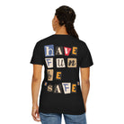 Someone wears the Printify "Have Fun Be 'Safe' Tee," a stylish black premium shirt featuring vibrant back text, "Have Fun Be Safe." Made from soft US cotton like the Comfort Colors 1717 line, it offers both comfort and flair.