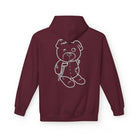 Back of the Printify Mascot Hoodie in maroon features a white outline drawing of a teddy bear, crafted with sustainable fashion in mind.