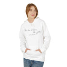 A person wears Printify’s The Less I Know Hoodie—a white, sustainable hoodie with “The less I know the better -your favorite” on the front, hands in pocket, crafted with eco-friendly production.