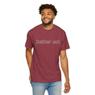 A man in a Printify Mascot Tee, crafted from soft US cotton in maroon, featuring the text "Better not," is smiling and walking.