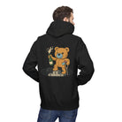 A person wearing the Podium Bear Hoodie by Printify, which is a sustainable black hoodie featuring a teddy bear celebrating on a podium with champagne on the back. This eco-friendly design is perfect for those who love unique style and care about the planet.