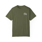 The Script Tee by Printify is an olive green t-shirt made from 100% premium US cotton. It features a white "Bn" logo on the left chest and is crafted from garment-dyed fabric for ultimate comfort and style.