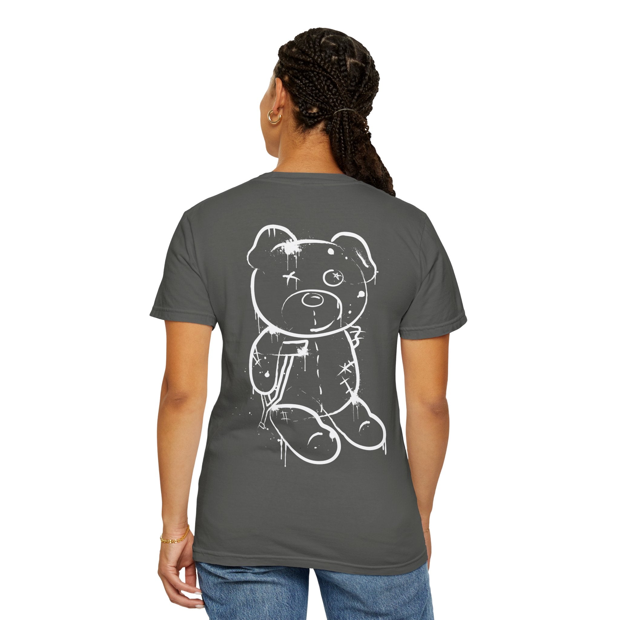 A person wears a dark gray "Graffiti Bear Tee" by Printify, made from 100% US cotton, showcasing a large white teddy bear sketch on the back.