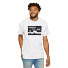 A man dons the Live Young Tee by Printify, showcasing "Youngest I'll Ever Be" with a lounging figure graphic. Made from 100% US cotton, this Comfort Colors classic combines style and comfort seamlessly.