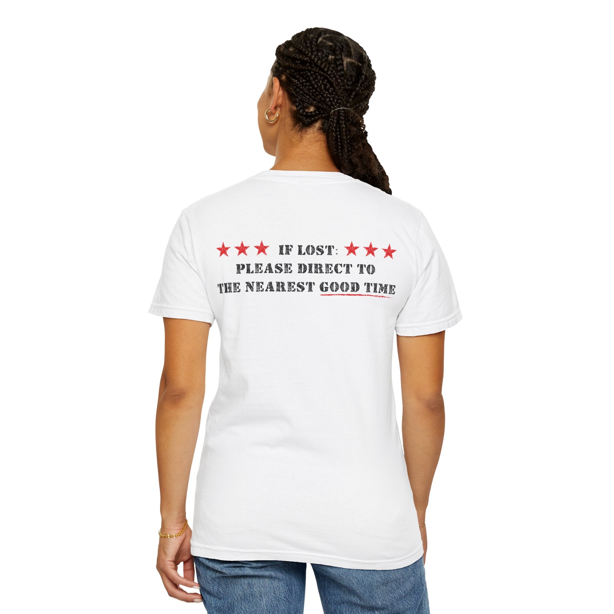 A person with braided hair wears The Good Time Tee from Printify, crafted from 100% US cotton. It has a white design with red stars and playful back text: "IF LOST: PLEASE DIRECT TO THE NEAREST GOOD TIME.