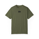 The Bad Decisions Tee by Printify is a Comfort Colors olive green shirt with "Bn" in bold black on the front. It's made from 100% ring-spun cotton with garment-dyed fabric, offering exceptional comfort and a rich, lived-in look.