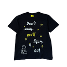 An oversized black Don't Worry Tee by Better not with yellow text that reads "don't worry, you'll figure it out," accompanied by stars, lines, and an illustration of a sitting bear.