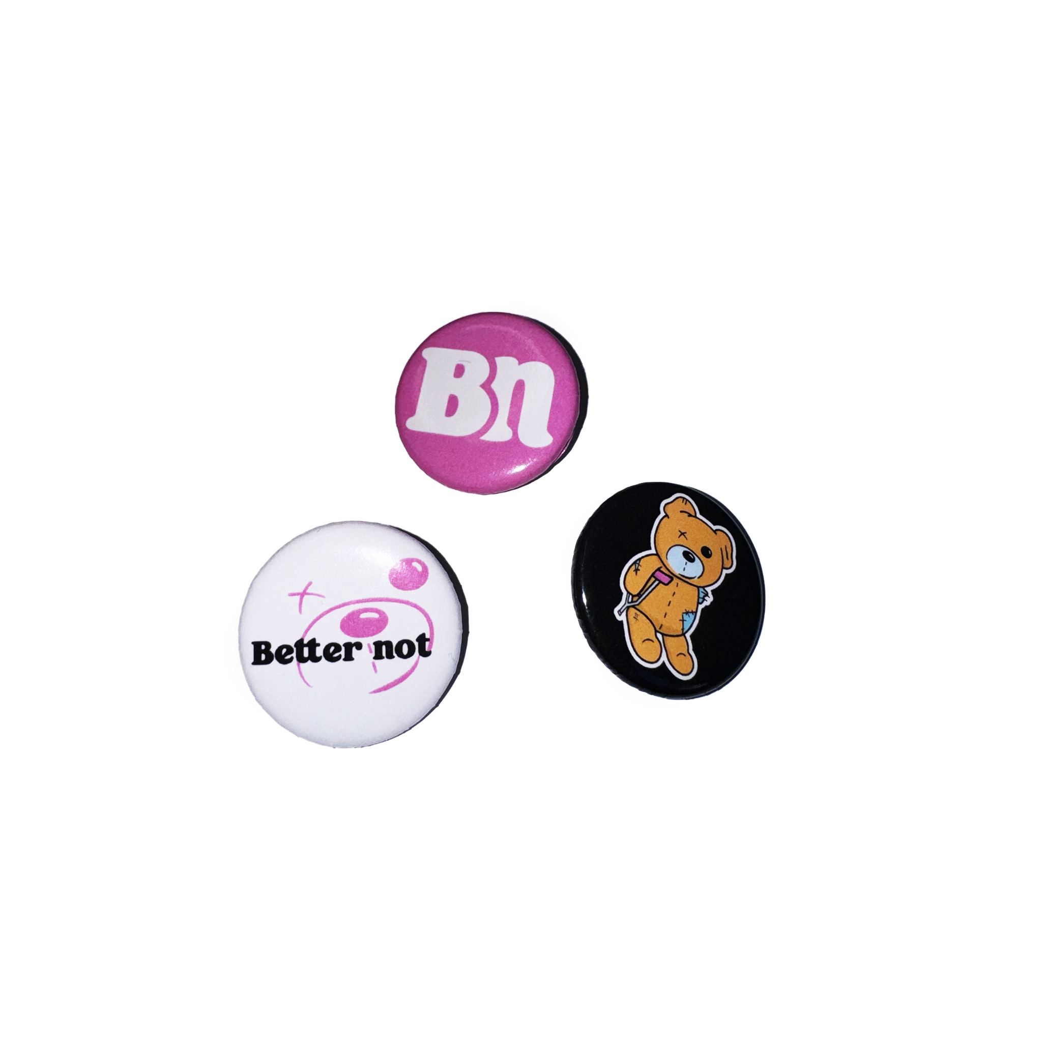 Three 3-Pack Pins: one pink with "bn", one white with "better not" and a pink cross, one black with a cartoon bear on a backpack.