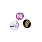 Three 3-Pack Pins: one pink with "bn", one white with "better not" and a pink cross, one black with a cartoon bear on a backpack.